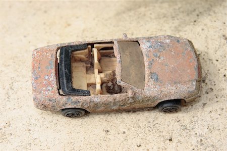 an old rusty toy classic car close up from above Stock Photo - Budget Royalty-Free & Subscription, Code: 400-05161966