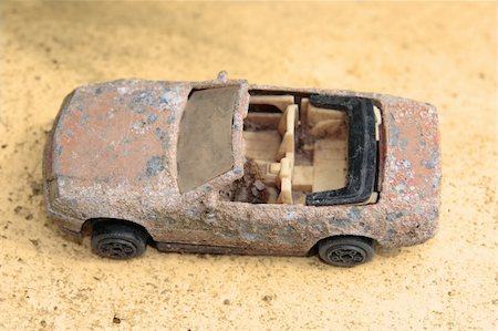 an old rusty toy classic car close up from above Stock Photo - Budget Royalty-Free & Subscription, Code: 400-05161967