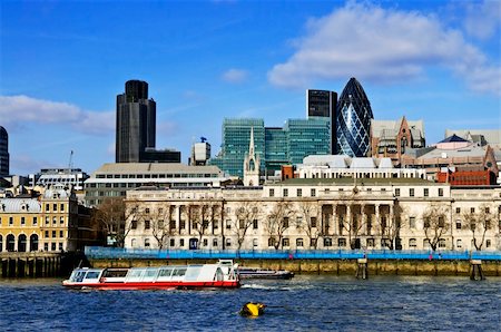 London skyline view from Thames river against blue sky Stock Photo - Budget Royalty-Free & Subscription, Code: 400-05174384