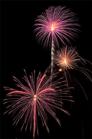 simsearch:400-04882938,k - Beautiful fireworks fill the night time sky Stock Photo - Budget Royalty-Free & Subscription, Code: 400-05175452