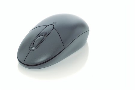 A black computer mouse isolated on white with clipping path Stock Photo - Budget Royalty-Free & Subscription, Code: 400-05176593