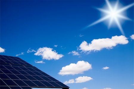 pollution sun - Bright sun over a photovoltaic pannels. Stock Photo - Budget Royalty-Free & Subscription, Code: 400-05176652