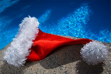 spanishalex (artist) - Nice santa hat by a blue swimming pool Stock Photo - Budget Royalty-Free & Subscription, Code: 400-05179092