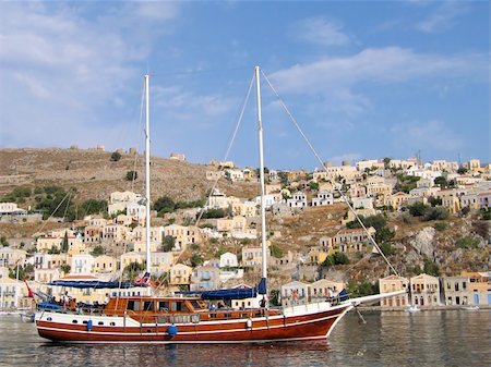 simsearch:400-04793526,k - Sailing vessel in the harbor of the Greek city Stock Photo - Budget Royalty-Free & Subscription, Code: 400-05179434