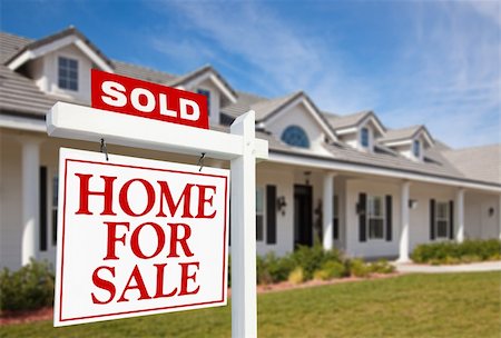 simsearch:700-03508131,k - Sold Home For Sale Sign in front of Beautiful New Home. Stock Photo - Budget Royalty-Free & Subscription, Code: 400-05186678