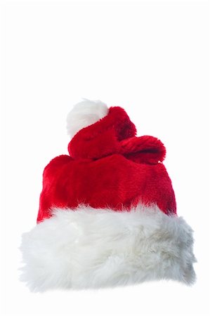 simsearch:400-08491819,k - Santa's red hat isolated over white background Photographie de stock - Aubaine LD & Abonnement, Code: 400-05187327