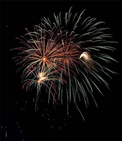 simsearch:400-04882938,k - Beautiful fireworks fill the night time sky Stock Photo - Budget Royalty-Free & Subscription, Code: 400-05180744