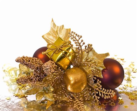 simsearch:400-05381288,k - Christmas ornament - golden branch with baubles, gift box, leaves and other decorations Stock Photo - Budget Royalty-Free & Subscription, Code: 400-05182353