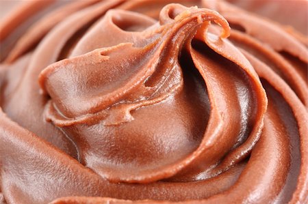 A swirl chocolate frosting background Stock Photo - Budget Royalty-Free & Subscription, Code: 400-05195012