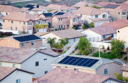 solar panel home - Contemporary Neighborhood Roof Tops View with Solar Panels. Stock Photo - Budget Royalty-Free & Subscription, Code: 400-05195251