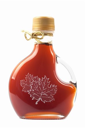 Maple Syrup Bottle isolated on a white background. Image is at 21 megapixels. Stock Photo - Budget Royalty-Free & Subscription, Code: 400-05196030