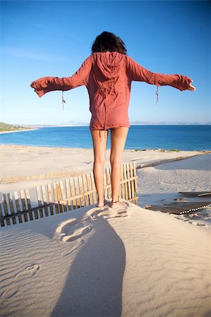 simsearch:859-07284165,k - woman at sand dune in spain with african horizon Stock Photo - Budget Royalty-Free & Subscription, Code: 400-05197697