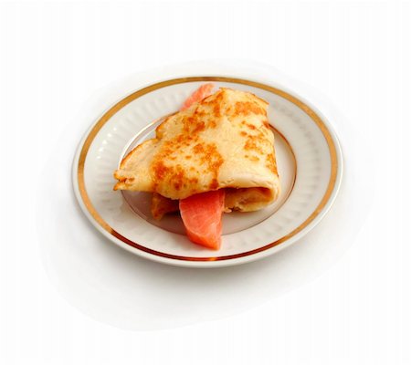 edible picture of fish - Salmon with  pancake on plate isolated on white. Stock Photo - Budget Royalty-Free & Subscription, Code: 400-05197714