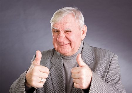 simsearch:400-06142278,k - senior man showing thumb up on a isolated white background Stock Photo - Budget Royalty-Free & Subscription, Code: 400-05197737