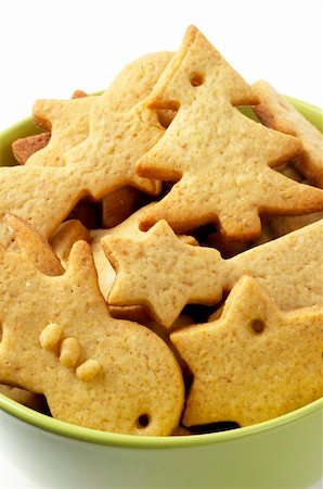 simsearch:400-05721521,k - Christmas ginger butter cookies in the olive bowl macro shot Stock Photo - Budget Royalty-Free & Subscription, Code: 400-05191219