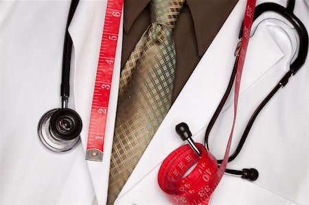 fat man exercising - Doctor with Stethoscope and Red Measuring Tape. Stock Photo - Budget Royalty-Free & Subscription, Code: 400-05192352