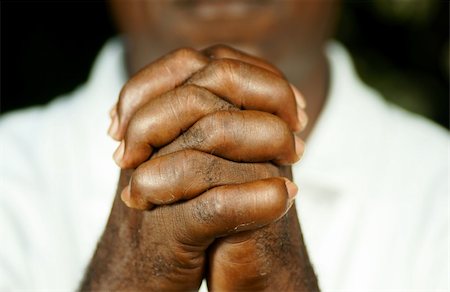 simsearch:400-04790442,k - fingers of afro man clasped in front of his body Stock Photo - Budget Royalty-Free & Subscription, Code: 400-05193079