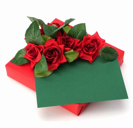 simsearch:400-04304378,k - Gift with floral decor. Flowers are artificial. Photographie de stock - Aubaine LD & Abonnement, Code: 400-05193443