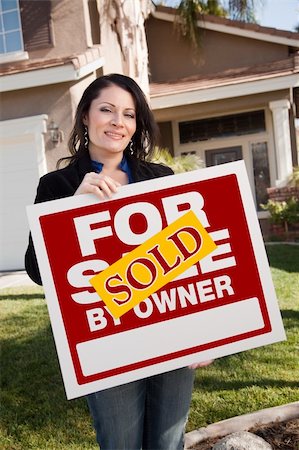 simsearch:693-03308239,k - Happy Attractive Hispanic Woman Holding Sold For Sale By Owner Real Estate Sign In Front of House Stock Photo - Budget Royalty-Free & Subscription, Code: 400-05193550