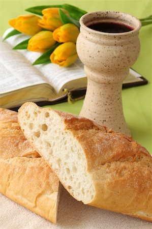 simsearch:400-05890930,k - Chalice with red wine, bread, Holy Bible and tulips Stock Photo - Budget Royalty-Free & Subscription, Code: 400-05205503