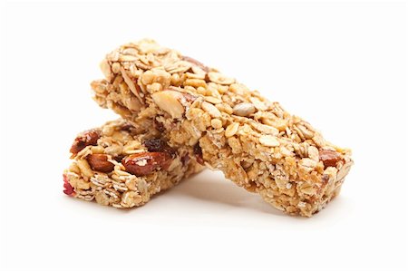 Two Nutritious Granola Bars Isolated on White with narrow Depth of Field. Stock Photo - Budget Royalty-Free & Subscription, Code: 400-05205746