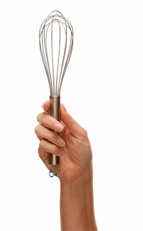 Woman Holding Egg Beater in the Air Isolated on a White Background. Stock Photo - Budget Royalty-Free & Subscription, Code: 400-05205776