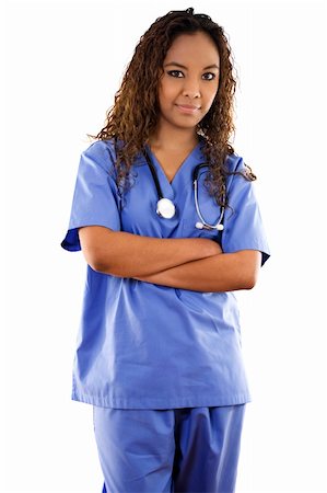 Stock image of woman wearing scrubs over white background Stock Photo - Budget Royalty-Free & Subscription, Code: 400-05206834