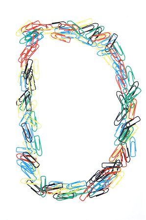 Letter D formed with colorful paperclips Stock Photo - Budget Royalty-Free & Subscription, Code: 400-05208679