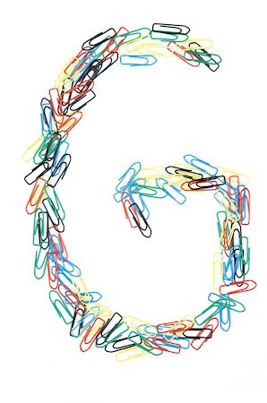 Letter G formed with colorful paperclips Stock Photo - Budget Royalty-Free & Subscription, Code: 400-05208682