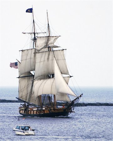 Niagara tall ship almost full sail, with a small power boat next to it you can see the real magnificent size of the tall ship. Stock Photo - Budget Royalty-Free & Subscription, Code: 400-05200667