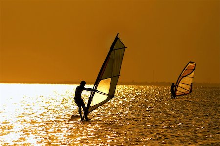 simsearch:400-03992760,k - Silhouettes of two windsurfers at the sunset Stock Photo - Budget Royalty-Free & Subscription, Code: 400-05201884