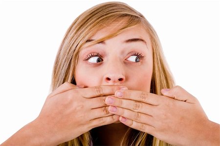 simsearch:400-04158321,k - Closeup of young women covering her mouth with both hands on a white isolated background Stock Photo - Budget Royalty-Free & Subscription, Code: 400-05201952