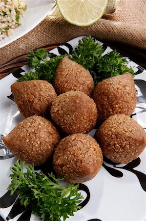 Deep fried Kibbe middle eastern lamb and bulgur wheat delicacy Stock Photo - Budget Royalty-Free & Subscription, Code: 400-05203353