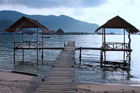 simsearch:400-03991814,k - Wooden pathway leading to gazebo over sea. Early morning Stock Photo - Budget Royalty-Free & Subscription, Code: 400-05216001