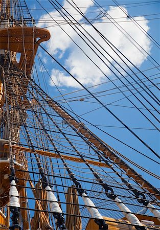simsearch:400-05124606,k - Natural fibre ropes, rigging and block and tackle on a wooden sailing ship. Stock Photo - Budget Royalty-Free & Subscription, Code: 400-05216856