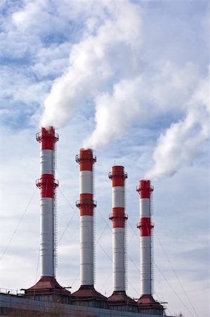 simsearch:400-07171274,k - Industrial site with smoking chimneys, steam against blue sky with clouds. Stock Photo - Budget Royalty-Free & Subscription, Code: 400-05217860