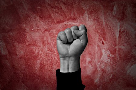 simsearch:400-06172579,k - clenched fist held high in protest Stock Photo - Budget Royalty-Free & Subscription, Code: 400-05218807