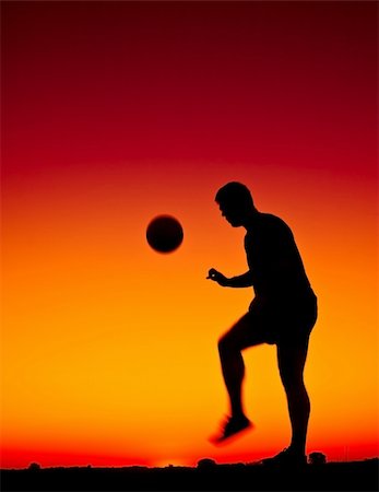 football at sunset Stock Photo - Budget Royalty-Free & Subscription, Code: 400-05210014