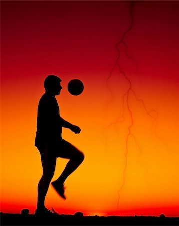 football at sunset Stock Photo - Budget Royalty-Free & Subscription, Code: 400-05210012