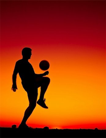 football at sunset Stock Photo - Budget Royalty-Free & Subscription, Code: 400-05210013
