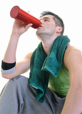 simsearch:400-05115517,k - young adult man relax and drink water with sweat on body Stock Photo - Budget Royalty-Free & Subscription, Code: 400-05210721