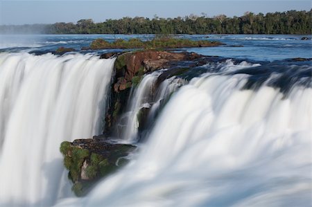 pictures of south america tropical waterfalls - Iguazu Falls located on the border of Brazil and Argentina Stock Photo - Budget Royalty-Free & Subscription, Code: 400-05212010