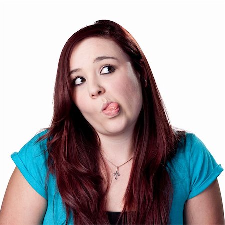 sticking out her tongue - Pretty red-head sticks out her tongue Stock Photo - Budget Royalty-Free & Subscription, Code: 400-05212258