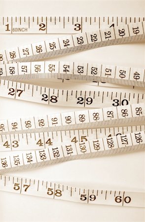 simsearch:400-04647880,k - Close-up of a tape measure Stock Photo - Budget Royalty-Free & Subscription, Code: 400-05212584