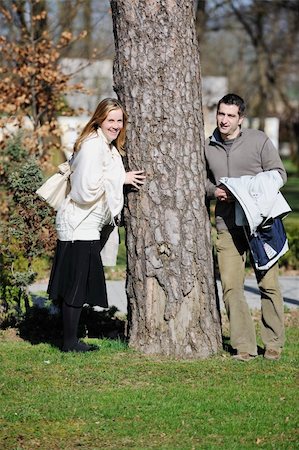 simsearch:400-04659391,k - happy young married family couple outdoor in nature have fun and waiting baby and representing young family growth and pregnancy concept Stock Photo - Budget Royalty-Free & Subscription, Code: 400-05225132