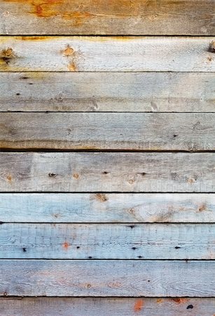 simsearch:400-05224637,k - The weathered wall is covered with wooden planks Stock Photo - Budget Royalty-Free & Subscription, Code: 400-05227645