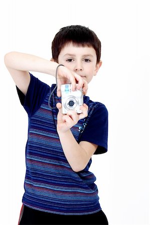 simsearch:400-04294580,k - Young boy with digital camera prepare for shooting Stock Photo - Budget Royalty-Free & Subscription, Code: 400-05227848