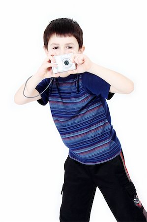 simsearch:400-04294580,k - Young boy with digital camera prepare for shooting Stock Photo - Budget Royalty-Free & Subscription, Code: 400-05228266