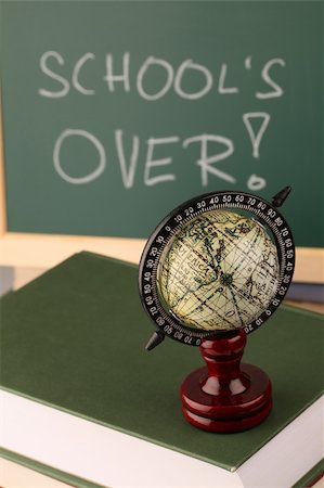 summer text message - Globe on a pile of books and a chalkboard in background with text: School is over Foto de stock - Super Valor sin royalties y Suscripción, Código: 400-05220756