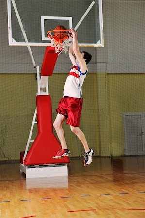 young healthy man play basketball game indoor in gym Stock Photo - Budget Royalty-Free & Subscription, Code: 400-05221906